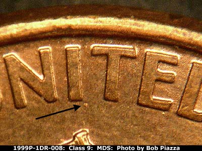 Die-stage B marker on 1999P•1DR•008 (1999 Doubled Die Reverse).