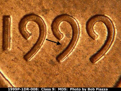 Die-stage B marker on 1999P•1DR•008 (1999 Doubled Die Reverse).