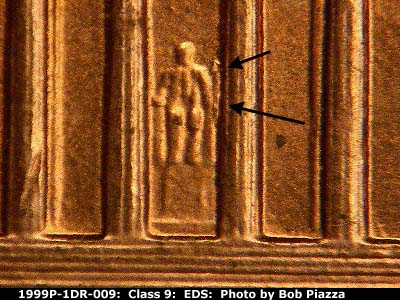 Die-stage A marker on 1999P•1DR•009 (1999 Doubled Die Reverse).