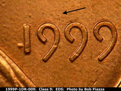 Die-stage A marker on 1999P•1DR•009 (1999 Doubled Die Reverse).