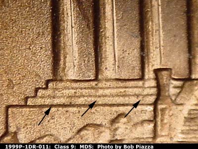 Die-stage B marker on 1999P•1DR•011 (1999 Doubled Die Reverse).