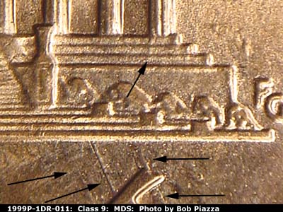 Die-stage B marker on 1999P•1DR•011 (1999 Doubled Die Reverse).