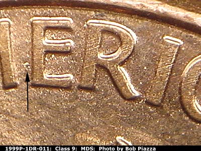Die-stage B marker on 1999P•1DR•011 (1999 Doubled Die Reverse).