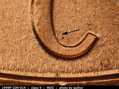 Die-stage B marker on 1999P•1DR•014 (1999 Doubled Die Reverse).