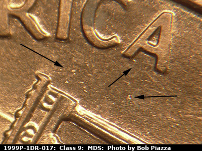Die-stage B marker on 1999P•1DR•017 (1999 Doubled Die Reverse).