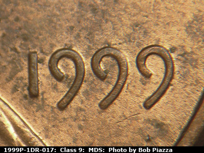 Die-stage B marker on 1999P•1DR•017 (1999 Doubled Die Reverse).