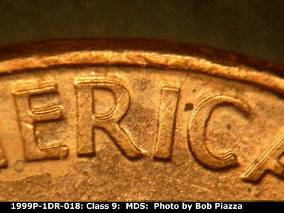Die-stage B marker on 1999P•1DR•018 (1999 Doubled Die Reverse).