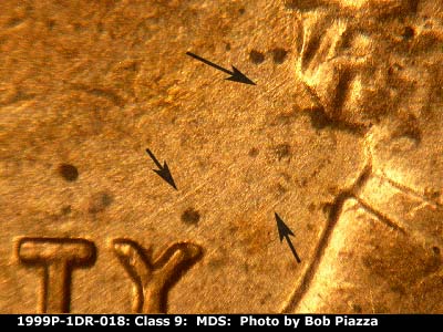 Die-stage B marker on 1999P•1DR•018 (1999 Doubled Die Reverse).