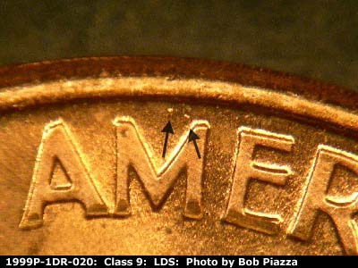 Die-stage C marker on 1999P•1DR•020 (1999 Doubled Die Reverse).