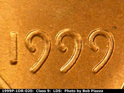 Die-stage C marker on 1999P•1DR•020 (1999 Doubled Die Reverse).