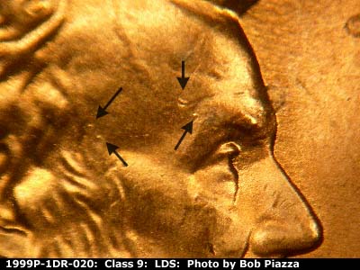 Die-stage C marker on 1999P•1DR•020 (1999 Doubled Die Reverse).