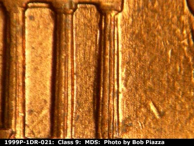 Die-stage B marker on 1999P•1DR•021 (1999 Doubled Die Reverse).