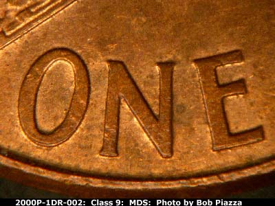 Die-stage B marker on 2000P•1DR•002 (2000 Doubled Die Reverse).