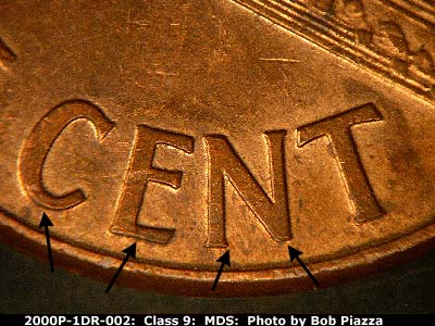 Die-stage B marker on 2000P•1DR•002 (2000 Doubled Die Reverse).
