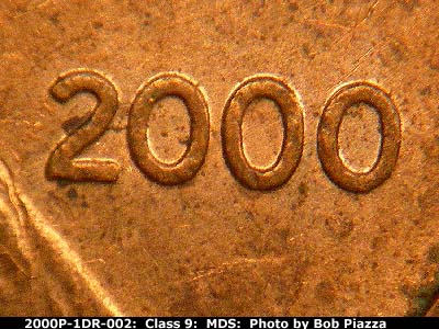 Die-stage B marker on 2000P•1DR•002 (2000 Doubled Die Reverse).