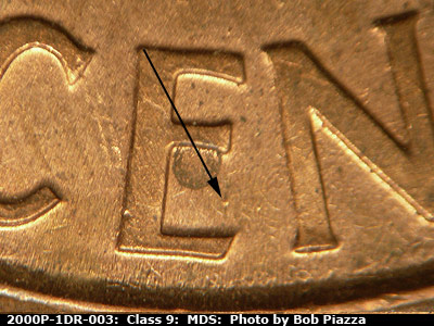 Die-stage B marker on 2000P•1DR•003 (2000 Doubled Die Reverse).