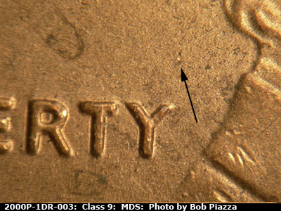 Die-stage B marker on 2000P•1DR•003 (2000 Doubled Die Reverse).