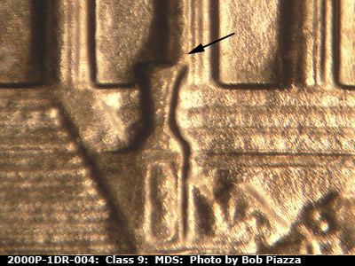 Die-stage B marker on 2000P•1DR•004 (2000 Doubled Die Reverse).