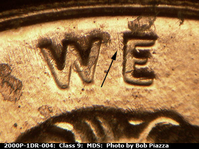 Die-stage B marker on 2000P•1DR•004 (2000 Doubled Die Reverse).