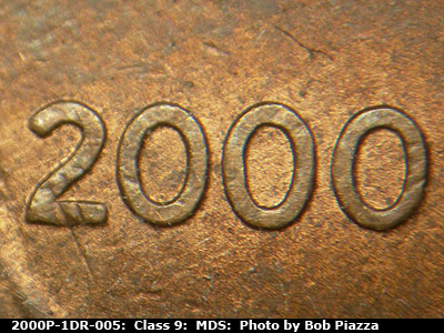 Die-stage B marker on 2000P•1DR•005 (2000 Doubled Die Reverse).