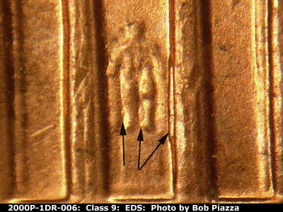 Die-stage A marker on 2000P•1DR•006 (2000 Doubled Die Reverse).