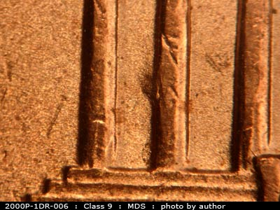 Die-stage B marker on 2000P•1DR•006 (2000 Doubled Die Reverse).