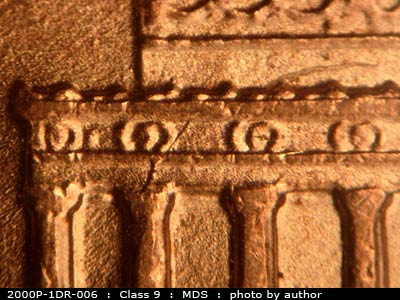 Die-stage B marker on 2000P•1DR•006 (2000 Doubled Die Reverse).