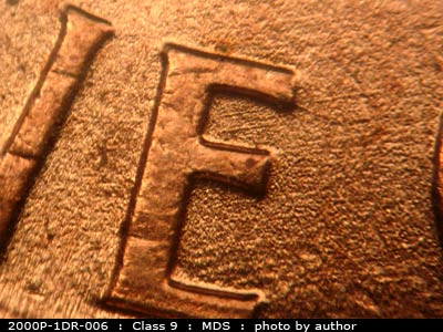 Die-stage B marker on 2000P•1DR•006 (2000 Doubled Die Reverse).