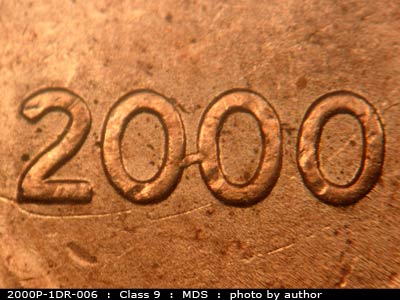 Die-stage B marker on 2000P•1DR•006 (2000 Doubled Die Reverse).