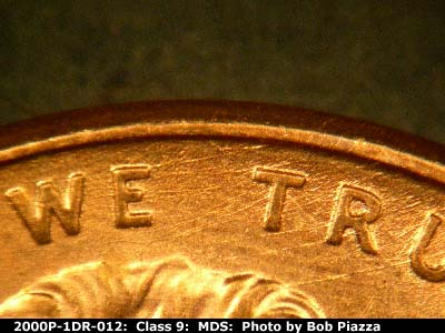 Die-stage B marker on 2000P•1DR•012 (2000 Doubled Die Reverse).