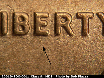 Die-stage B marker on 2001D•1DO•001 (2001 Doubled Die Obverse).