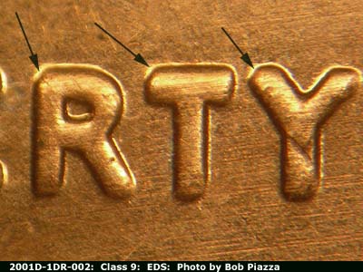 Die-stage A marker on 2001D•1DO•002 (2001 Doubled Die Obverse).