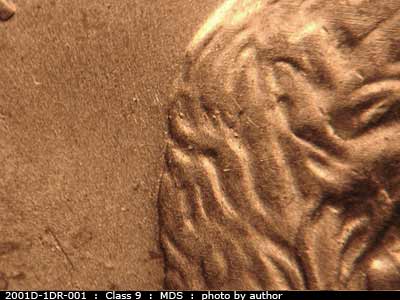 Die-stage B marker on 2001D•1DR•001 (2001 Doubled Die Reverse).