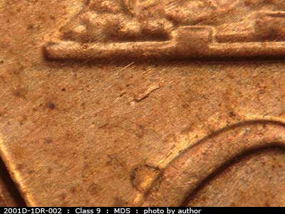 Die-stage B marker on 2001D•1DR•002 (2001 Doubled Die Reverse).