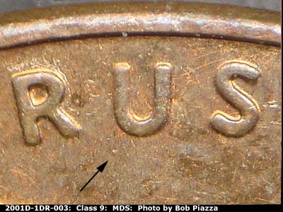 Die-stage B marker on 2001D•1DR•003 (2001 Doubled Die Reverse).