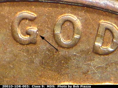 Die-stage B marker on 2001D•1DR•003 (2001 Doubled Die Reverse).