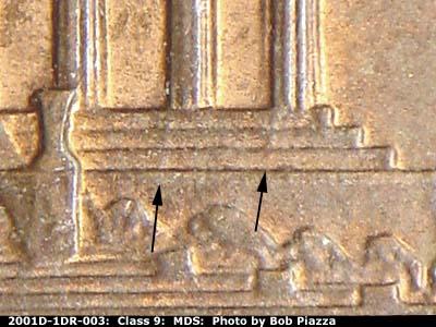 Die-stage B marker on 2001D•1DR•003 (2001 Doubled Die Reverse).