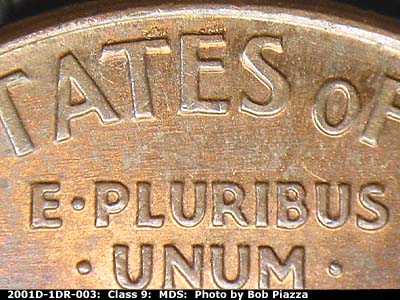 Die-stage B marker on 2001D•1DR•003 (2001 Doubled Die Reverse).