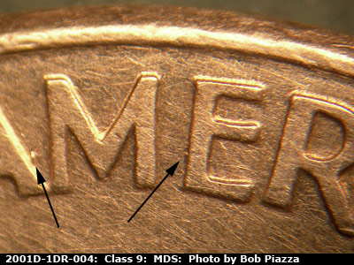 Die-stage B marker on 2001D•1DR•004 (2001 Doubled Die Reverse).
