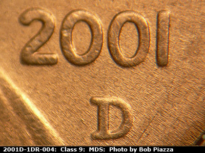 Die-stage B marker on 2001D•1DR•004 (2001 Doubled Die Reverse).