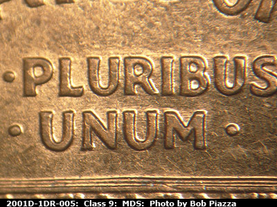 Die-stage B marker on 2001D•1DR•005 (2001 Doubled Die Reverse).