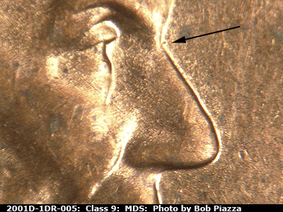 Die-stage B marker on 2001D•1DR•005 (2001 Doubled Die Reverse).