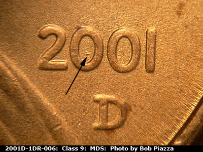 Die-stage B marker on 2001D•1DR•006 (2001 Doubled Die Reverse).