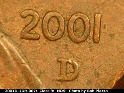 Die-stage B marker on 2001D•1DR•007 (2001 Doubled Die Reverse).