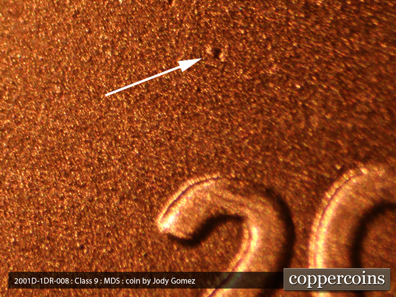 Die-stage B marker on 2001D•1DR•008 (2001 Doubled Die Reverse).