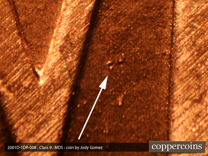 Die-stage B marker on 2001D•1DR•008 (2001 Doubled Die Reverse).