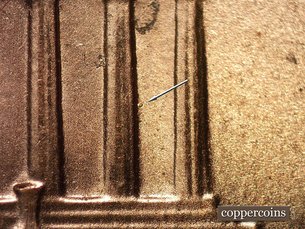 Die-stage B marker on 2001P•1DO•001 showing Die dot in bay 11.