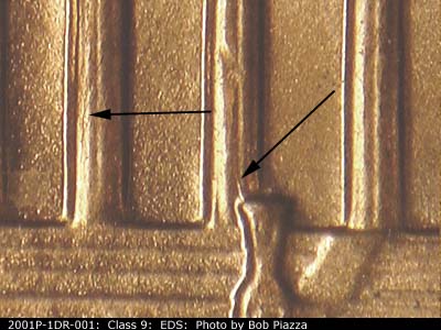 Die-stage A marker on 2001P•1DR•001 (2001 Doubled Die Reverse).