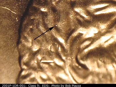 Die-stage A marker on 2001P•1DR•001 (2001 Doubled Die Reverse).