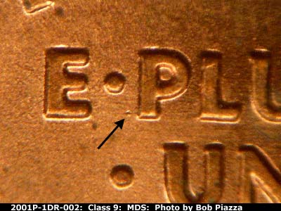 Die-stage B marker on 2001P•1DR•002 (2001 Doubled Die Reverse).